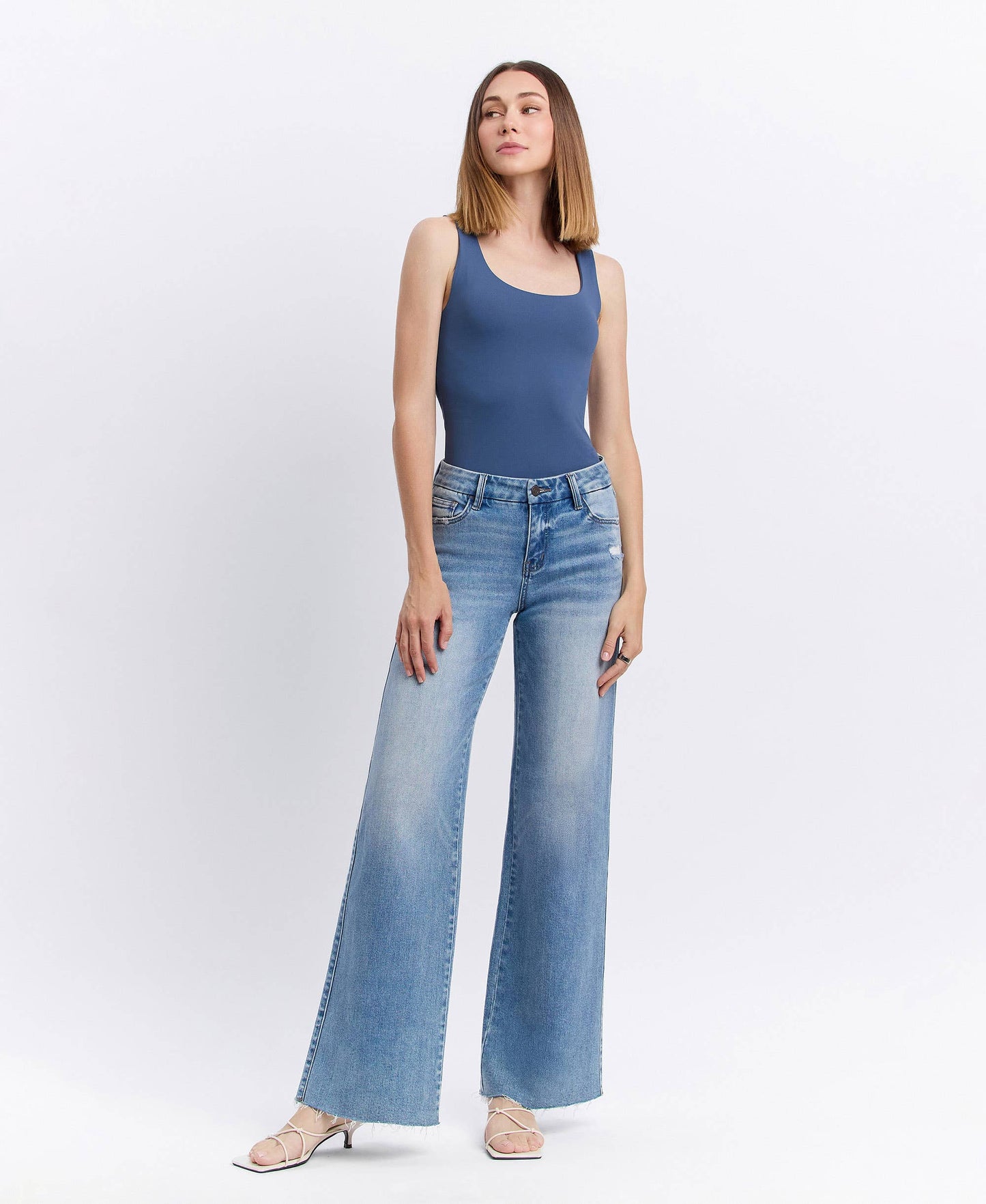 CAROLINA MID RISE CLEAN CUT RAW HEM WIDE JEANS