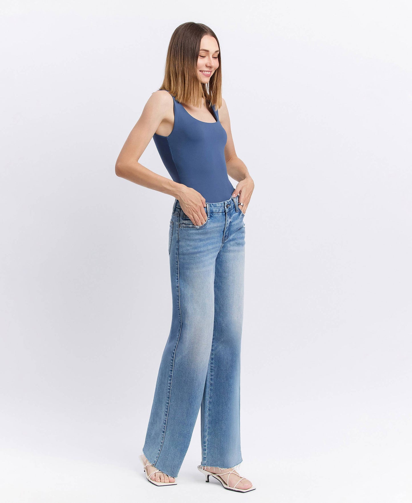 CAROLINA MID RISE CLEAN CUT RAW HEM WIDE JEANS